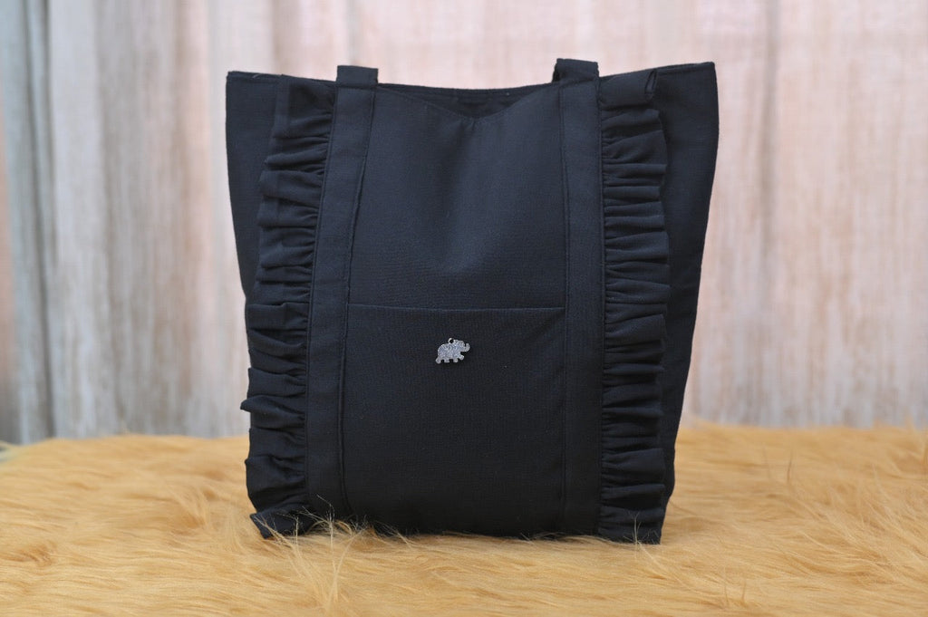 Ruffle trio handbags