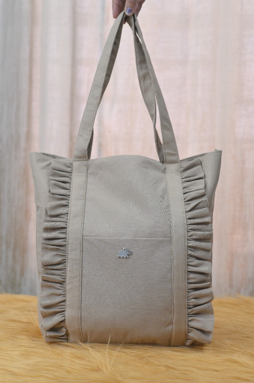 Ruffle trio handbags